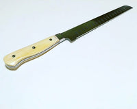 VG-10 serrated steel challah knife with custom handle