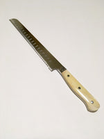 VG-10 serrated steel challah knife with custom handle