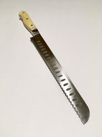 VG-10 serrated steel challah knife with custom handle