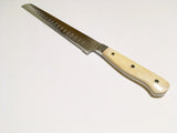 VG-10 serrated steel challah knife with custom handle