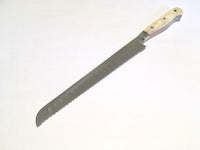 VG-10 serrated steel challah knife with custom handle