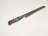 VG-10 serrated steel challah knife with custom handle