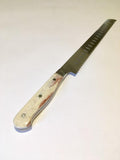 VG-10 serrated steel challah knife with custom handle